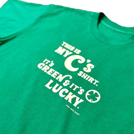 photo of green unisex t-shirt from the red seat with white text that says this is my celtics shirt. its green and its lucky on the front.