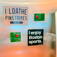 Fridge with magnets including 'I LOATHE PINSTRIPES' and 'I enjoy Boston sports.' from The Red Seat