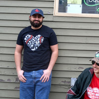 photo of man wearing unisex black t-shirt with heart shaped design with boston red sox fenway park designs