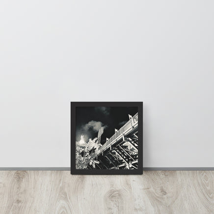 Black and white fine art photograph of the back of fenway park green monster nighttime in black frame