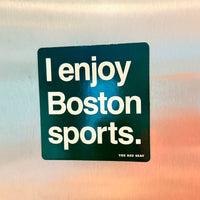 Refrigerator magnet with 'I enjoy Boston sports.' text on a reflective surface