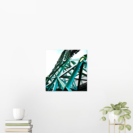 photograph of a boston red sox fenway park light tower looking up with green metal and a light sky, on a wall