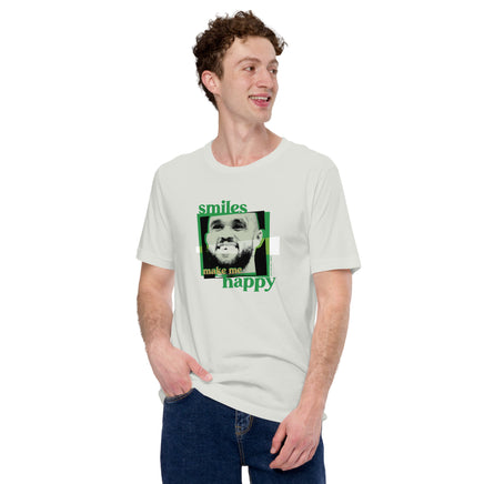man wearing silver grey unisex shirt with boston celtics derrick white smiling with a chipped tooth