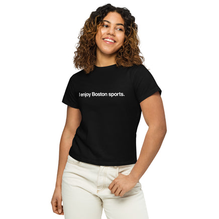 woman wearing women's black t-shirt with the words i enjoy boston sports in white simple text.