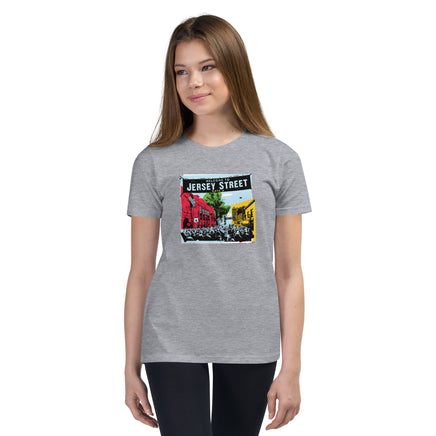 photo of girl wearing light grey t-shirt with boston red sox fenway park jersey street gate a design with blocks of color