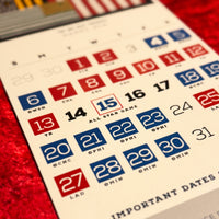 close up photo of 2025 calendar from the red seat with full MLB red sox schedule