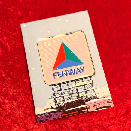 Card with Fenway Park Citgo Sign on a red surface