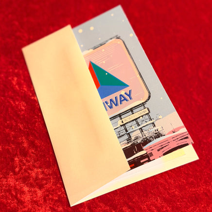 Card with Fenway Park Citgo Sign on a red surface with envelope