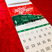 December 2027 Season's Greetings illustration of a snowy Fenway Park exterior above the date grid