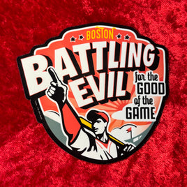 Vinyl sticker with the words battling evil for the good of the game in a shield with fenway park