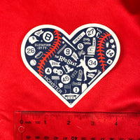 photo of large heart shaped stickers made up of important symbols for the boston red sox with ruler