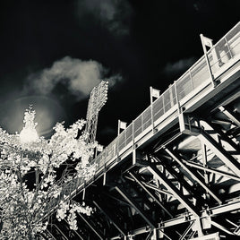Black and white fine art photograph of the back of fenway park green monster nighttime