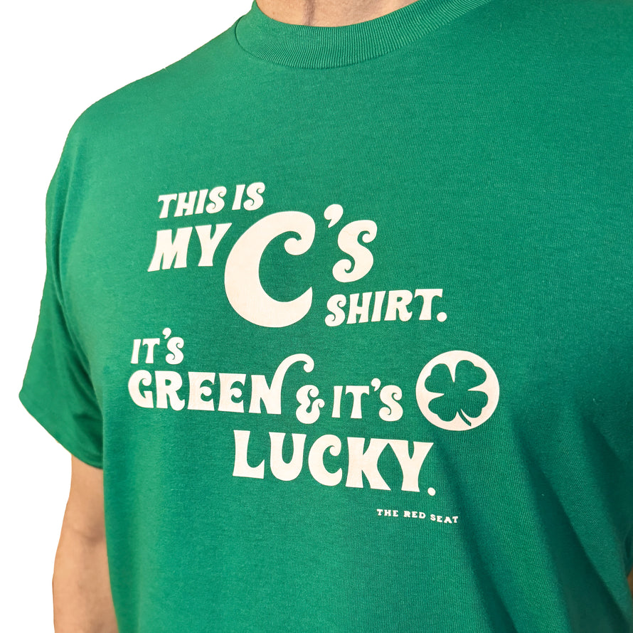 photo of man wearing green unisex t-shirt from the red seat with white text that says this is my celtics shirt. its green and its lucky on the front.