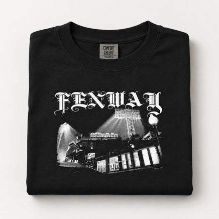 Fenway Gothic youth tee folded, showing the Comfort Colors youth label and the Fenway Park night photo print