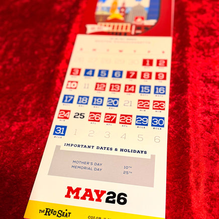 Calendar with May 26 highlighted on a red textured background