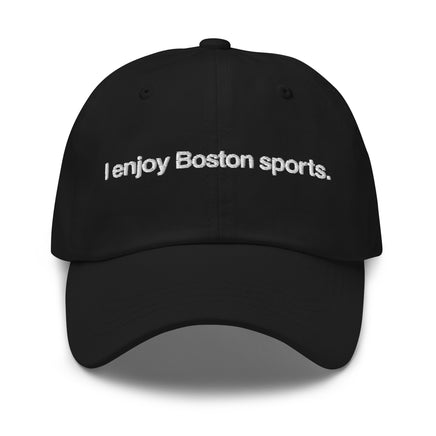 black baseball cap with "i enjoy boston sports" embroidered in white helvetica font