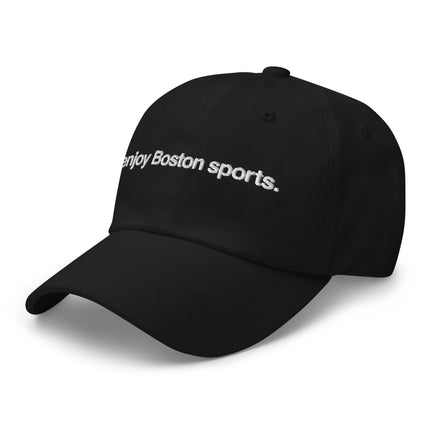 sideview of black baseball cap with "i enjoy boston sports" embroidered in white helvetica font