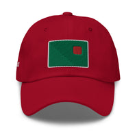photo of a red baseball cap with fenway park's red seat embroidered on the front in green and red.