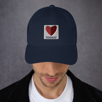 man wearing graphic of the citgo sign boston fenway as a heart embroidered on baseball hat
