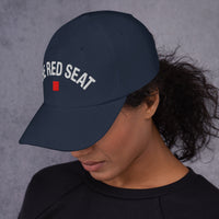 side view of Female Model wearing navy Wordmark Edition hat