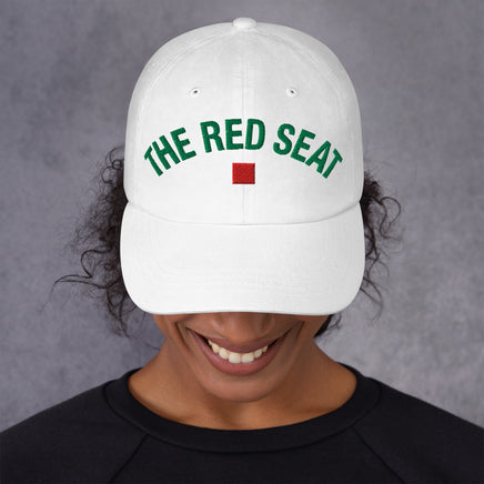 Female Model wearing white Wordmark Edition baseball cap