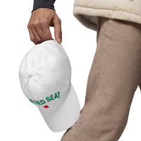 Model holding white The Red Seat Wordmark Edition baseball cap