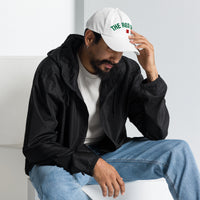 Male Model wearing white The Red Seat Wordmark Edition baseball cap while sitting