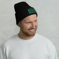 photo of a man wearing black beanie with the red seat logo in green and red embroidered on the cuff