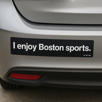 Bumper sticker on a car reading 'I enjoy Boston sports.'