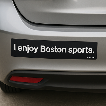 Bumper sticker on a car reading 'I enjoy Boston sports.'