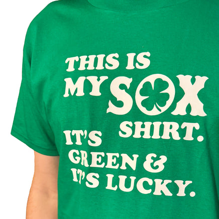 close up photo of man wearing green unisex t-shirt from the red seat with white text that says "this is my sox shirt. it's green and it's lucky" on the front.