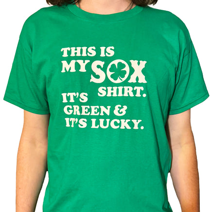 photo of man wearing green unisex t-shirt from the red seat with white text that says "this is my sox shirt. it's green and it's lucky" on the front.