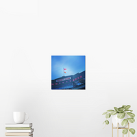 Photograph of the inside of fenway park boston red sox pride flag with american flag, on a living room wall