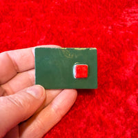 Green square handmade magnet with a red square