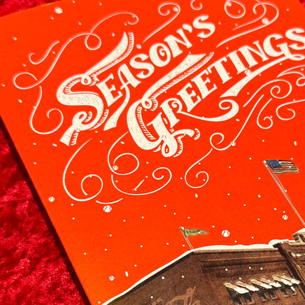 close up photo of Season's Greetings! (Greeting Card Pack)-The Red Seat old time photograph of fenway park with red sky snowing holiday card pack