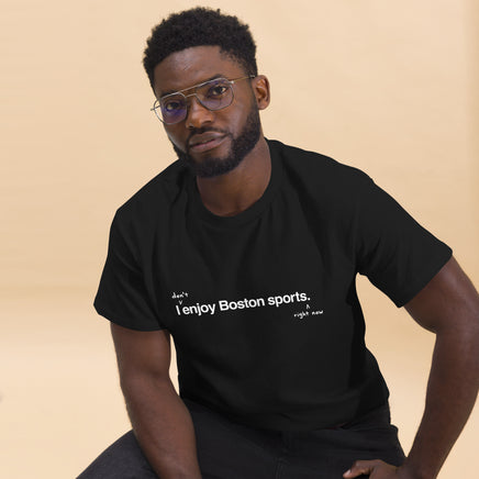 man wearing I don't enjoy Boston sports right now. t-shirt, black unisex tee with handwritten annotation over original design