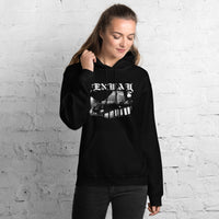 Woman wearing the Fenway Gothic hoodie against a white brick wall