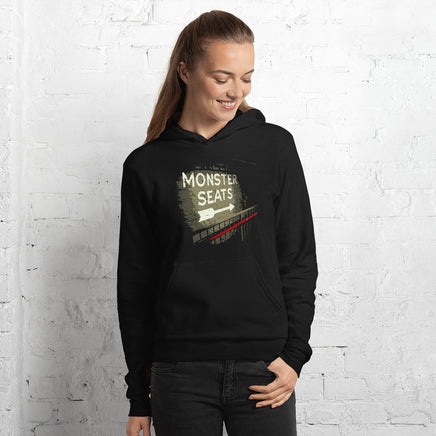 photo of woman wearing Monster Seats-The Red Seat Design with the words Monster Seats painted on a wall fenway park boston black hoodie sweatshirt