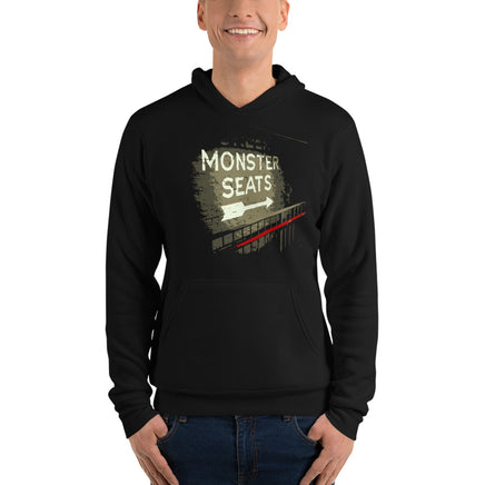 photo of man wearing Monster Seats-The Red Seat Design with the words Monster Seats painted on a wall fenway park boston black hoodie sweatshirt