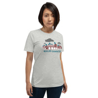 photo of woman wearing grey unisex t-shirt with the red seat building character design of the boston red sox fenway park.