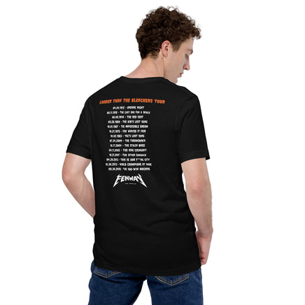 person wearing Back of black t-shirt reading "Louder Than the Bleachers Tour" in orange distressed lettering, with 15 significant Red Sox dates and events listed in tour date format, including Opening Night 1912 through the 108-Win Machine in 2018, with "FENWAY" logo at the bottom