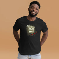 photograph of man wearing Monster Seats-The Red Seat Design with the words Green Monster Seats painted on a wall fenway on black unisex t-shirt park boston