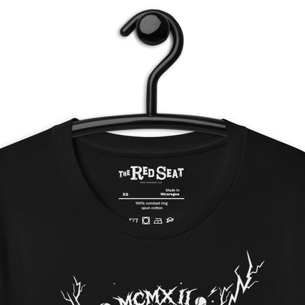Black t-shirt with 'The Red Seat' branding on a hanger against a white background