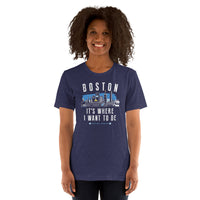 Woman wearing a navy blue t-shirt with 'Boston' text and graphic on a white background Navy blue t-shirt with 'Boston It's Where I Want to Be' design on a hanger and tartan army