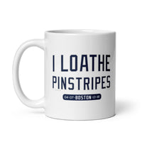 11 oz white ceramic mug with the words i loathe pinstripes in new york yankees lettering navy blue text and boston red sox world series wins